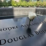 Why flowers are placed on some names at the 9/11 Memorial