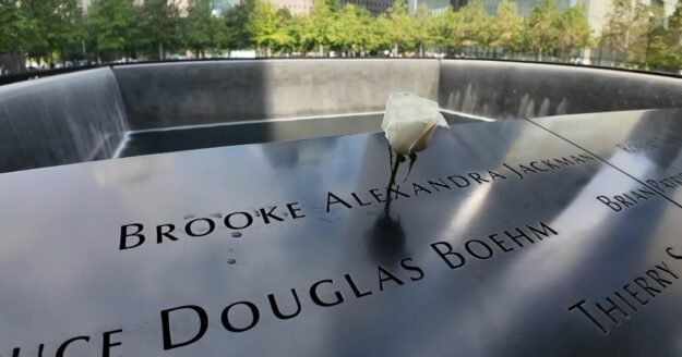 Why flowers are placed on some names at the 9/11 Memorial