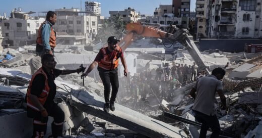 War-damaged Gaza building housing displaced Palestinian families collapses, killing at least 14 people