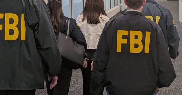 A busted-down door, an FBI search and a one-way ticket to China: Feds ask if accused Chinese agent had help