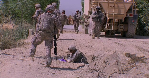 On the road with a bomb-hunting unit in Afghanistan | 60 Minutes Archive