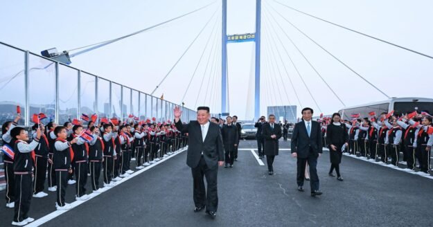 North Korea’s Kim Jong Un touts ties, opens bridge with China on first trip in a year