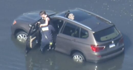 High tides break records, closing several roadways, flooding neighborhoods on both coasts
