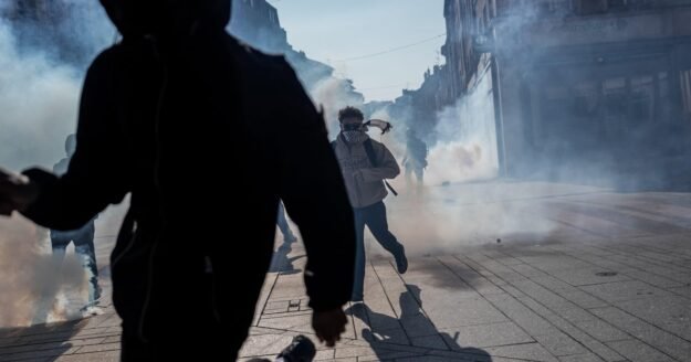 Teen loses hand picking up police grenade as France school protests continue