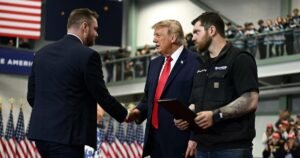 Trump issues pardons to 2 auto shop owners at Alaska rally
