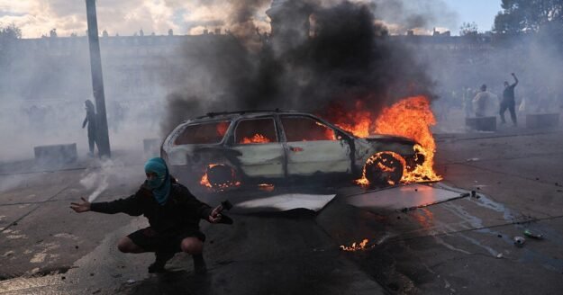 Protests erupt across France against rising living costs and in support of students