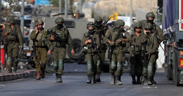 Israel’s Netanyahu vows major military operation, cordons off West Bank city after deadly attack on troops