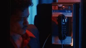 See Bruno Mars Serenade Karol G in New ‘Dance With Me’ Video